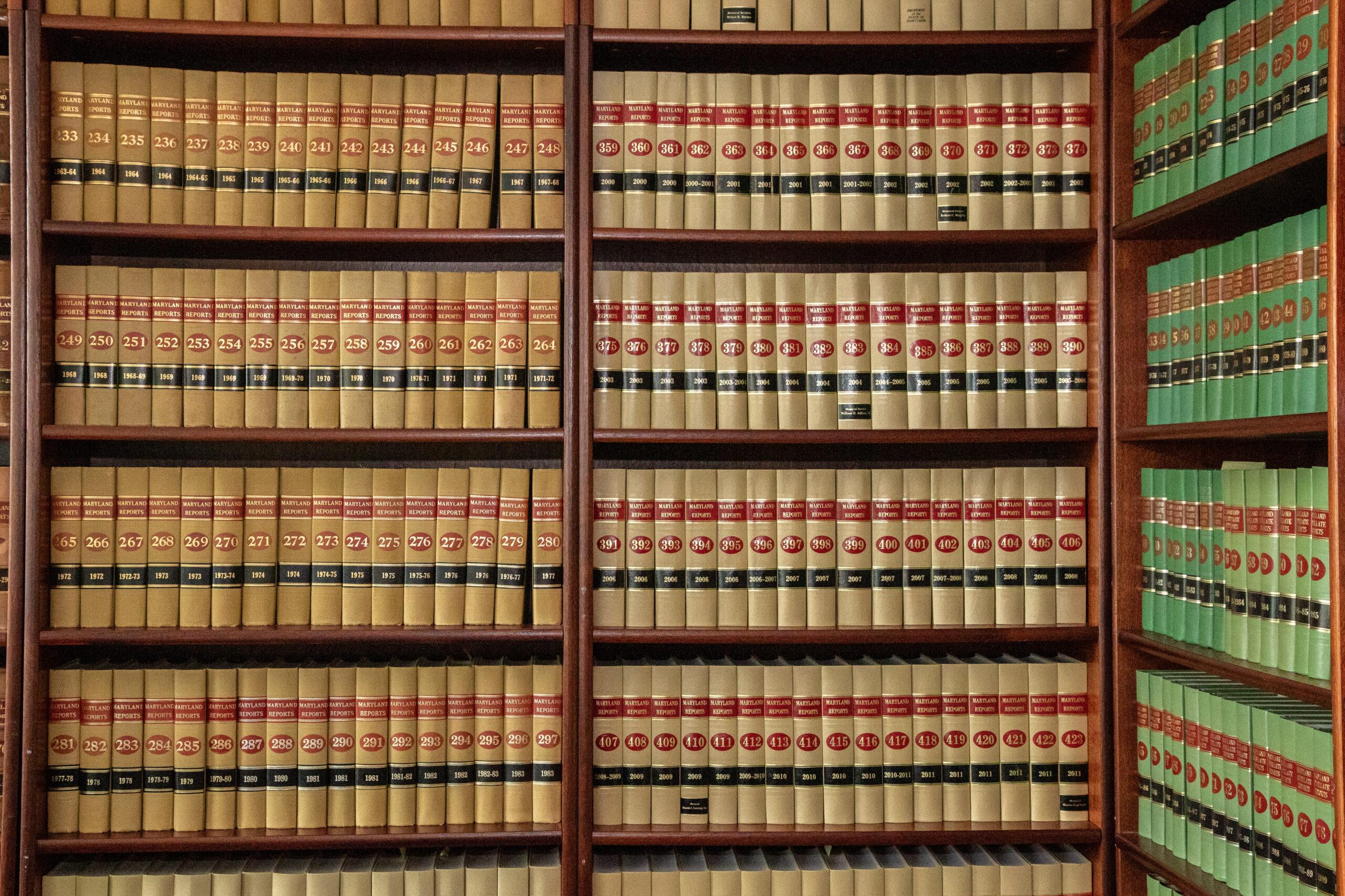 Wall of bound Maryland Reports legal volumes in the Gordon, Wolf & Carney law library
